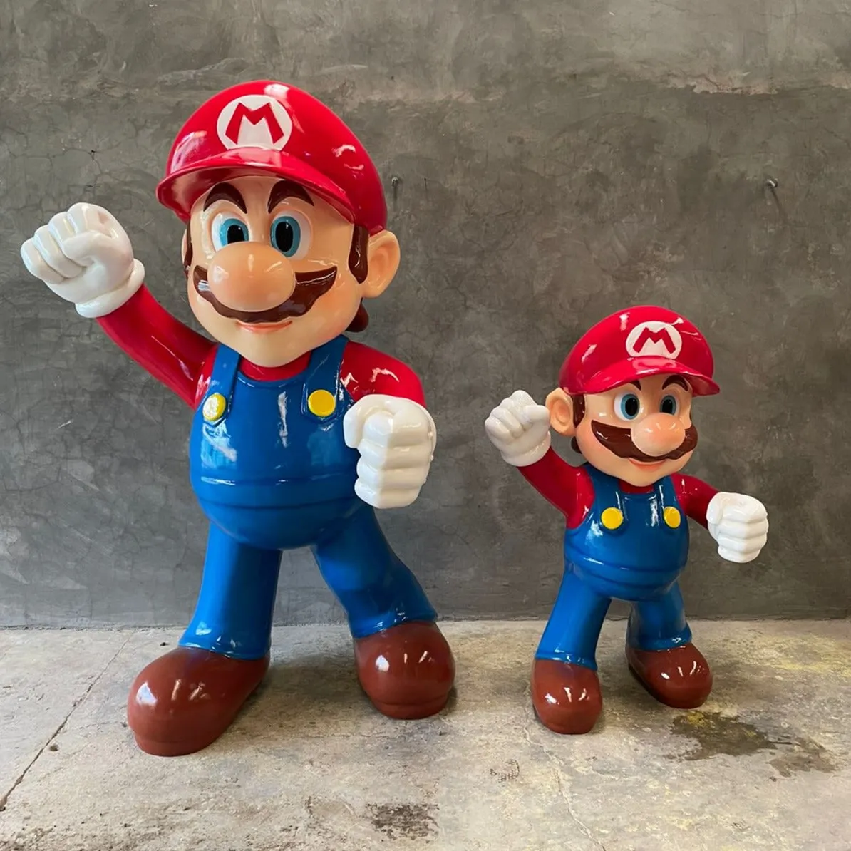 Large Jumper Boy Hand Up Over Sized Statue